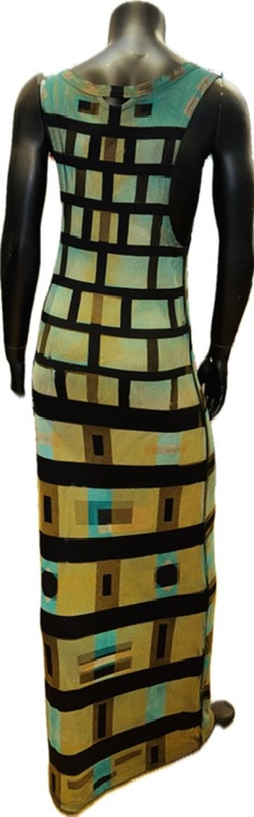 Rear view of the Geo Tribe Tank Dress on a mannequin, with black geometric lines over yellow and turquoise blocks.