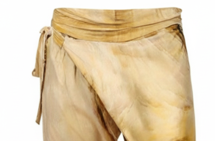 Carlton Jones Sedona wrap pants in a golden earth-tone print with side tie, front view.